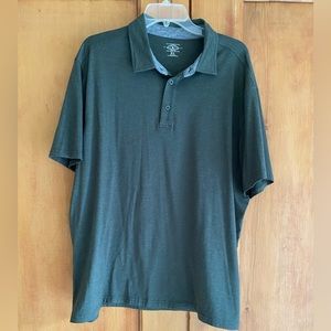 Hunter green G. H. Bass short sleeved collar shirt.